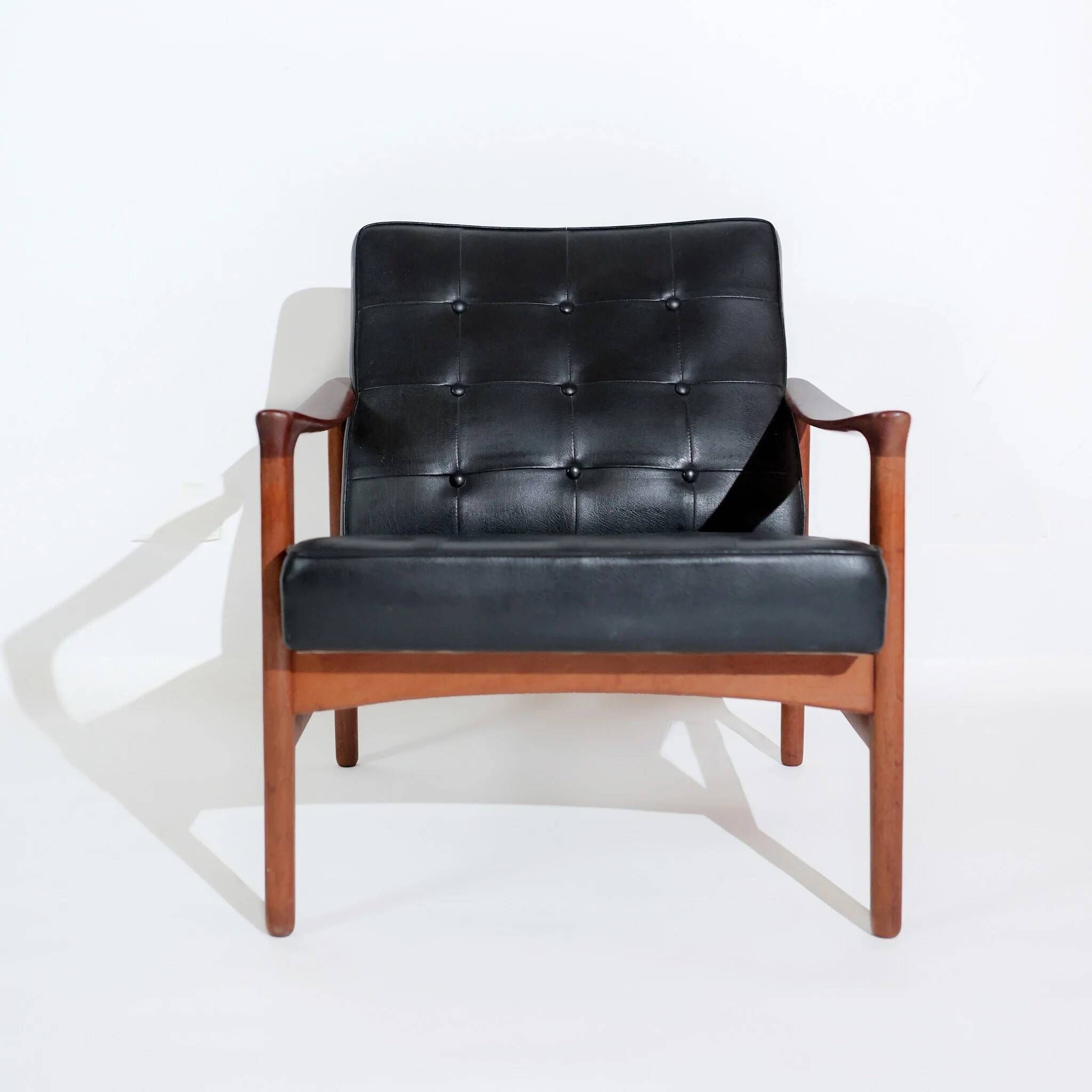 Vintage Scandinavian lounge chair by Bröderna Andersson, teak and black faux leather upholstery, 1950s-1960s.