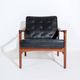 Vintage Scandinavian lounge chair by Bröderna Andersson, teak and black faux leather upholstery, 1950s-1960s.