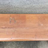 Old wooden bench with cast iron base