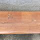 Old wooden bench with cast iron base