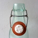 Glass bottle with ceramic cap from the 50s
