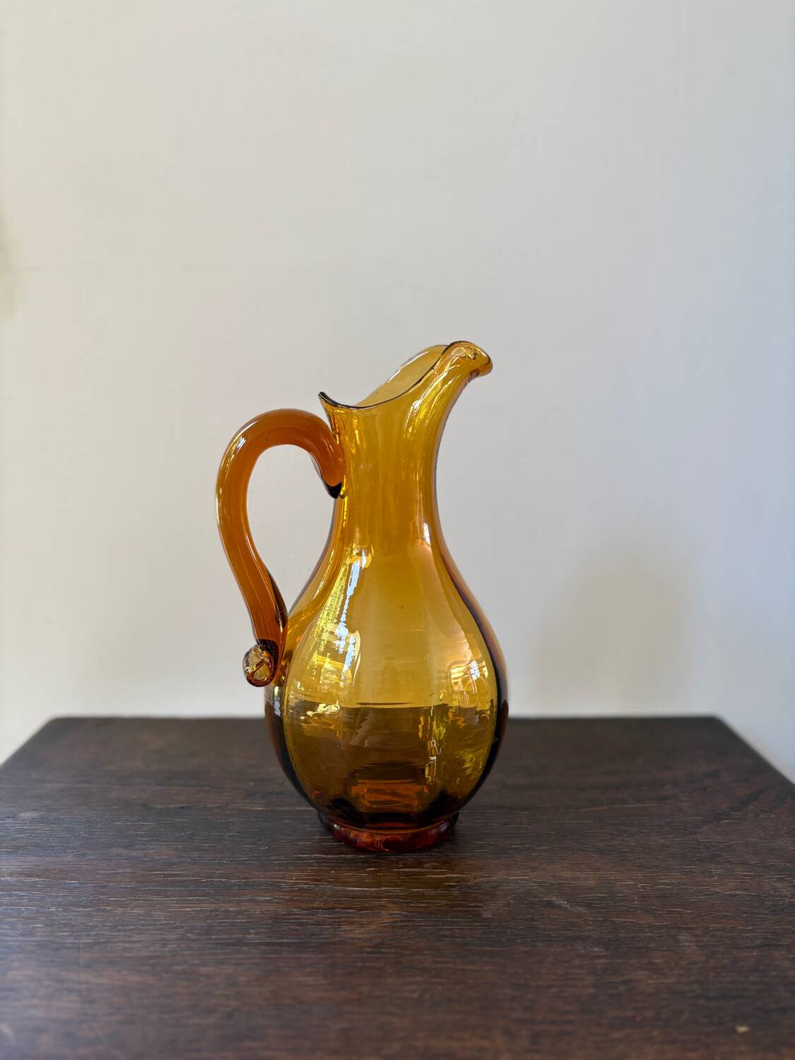 Vintage orange mouth-blown glass pitcher