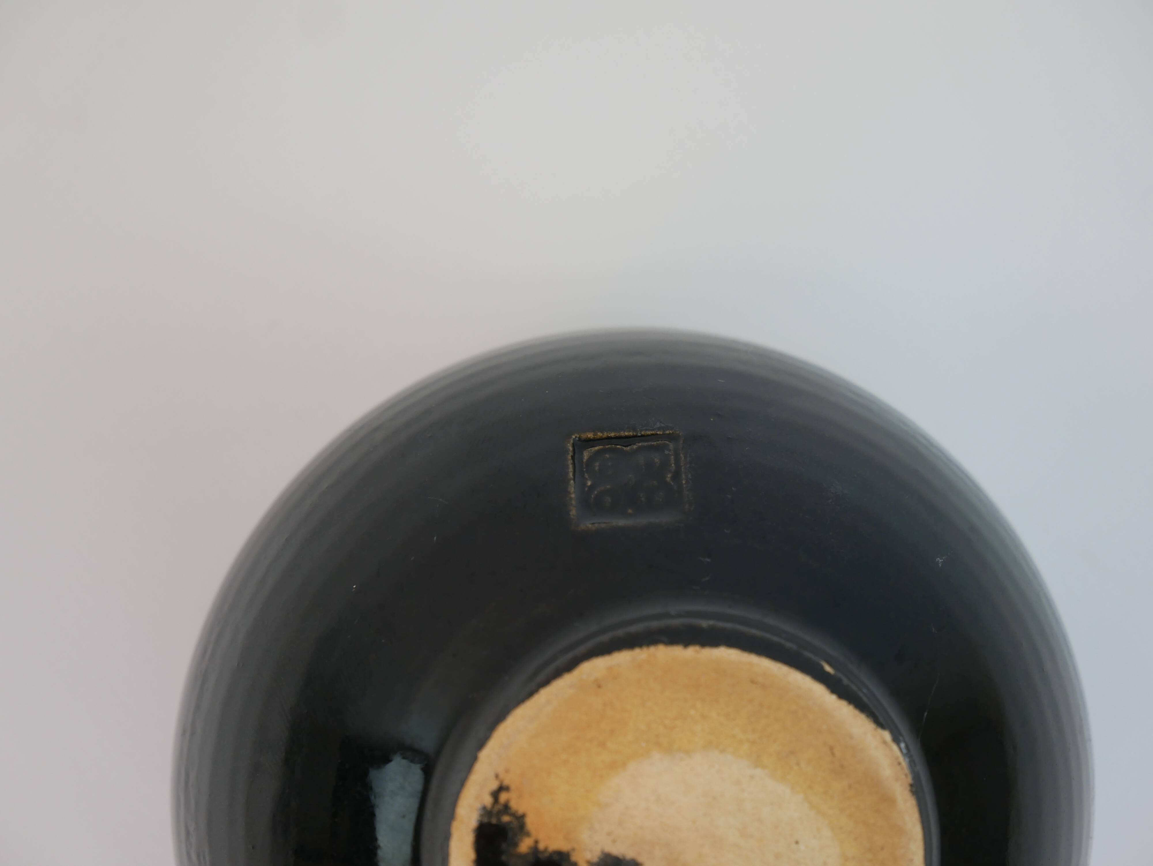 Black ceramic ball vase from Biot