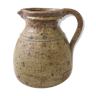 Pitcher in ancient sandstone