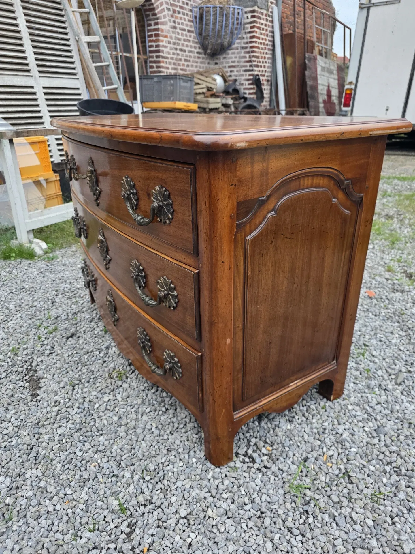 Curved Louis XV style chest of drawers in solid walnut