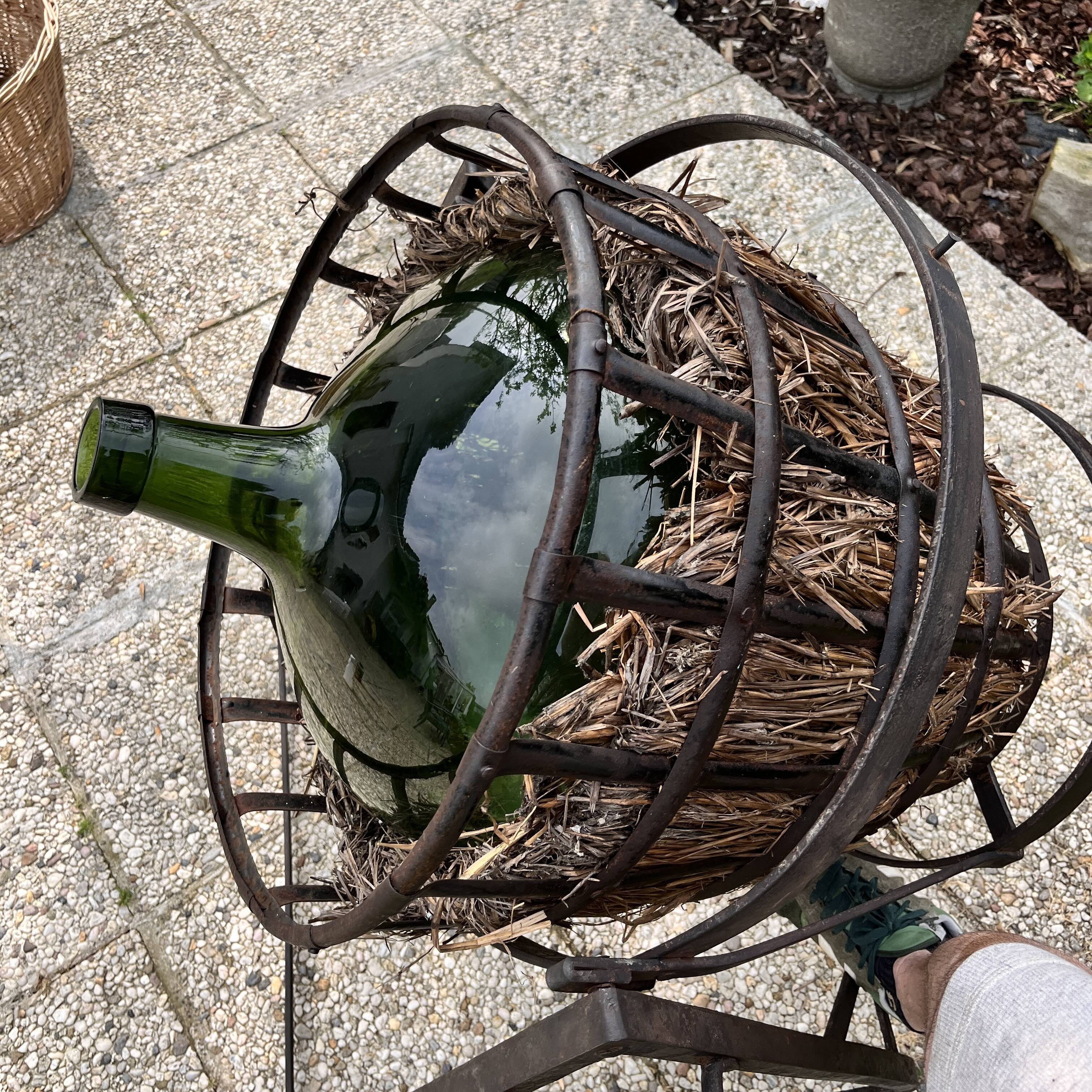 Demijohn on steel rocker