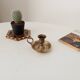 Vintage brass candle holder in gold.