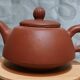 Yixing teapot in signed red clay