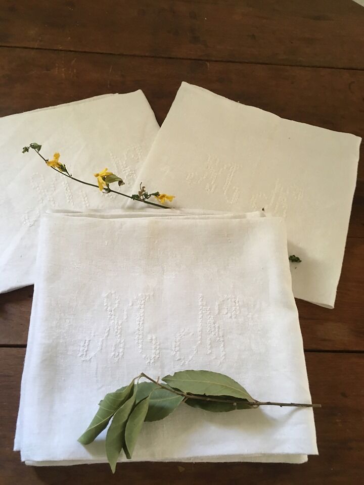 Six damask white towels and embroidered M N.