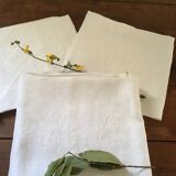 Six damask white towels and embroidered M N.