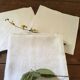 Six damask white towels and embroidered M N.