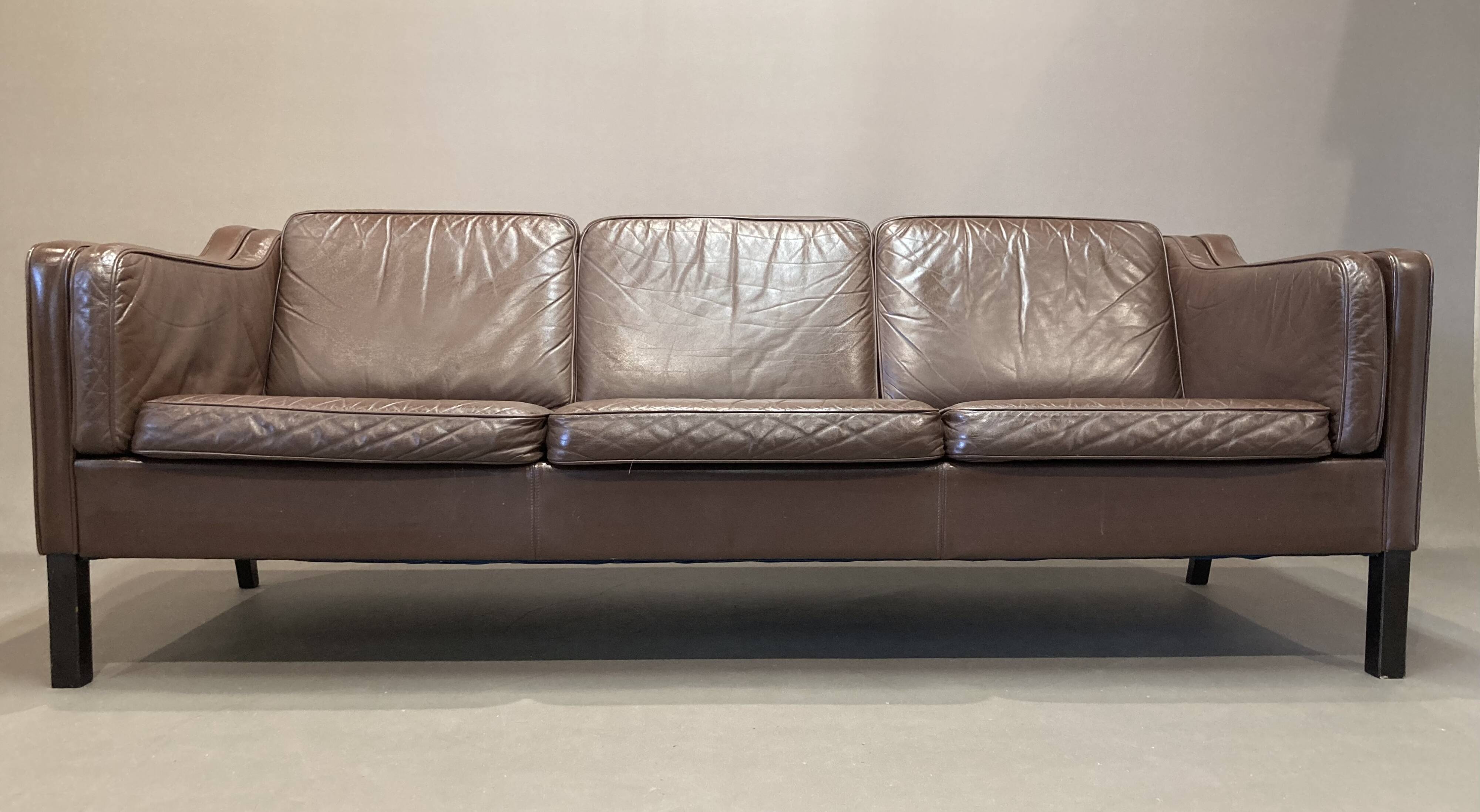 Scandinavian design 3-seater leather sofa.