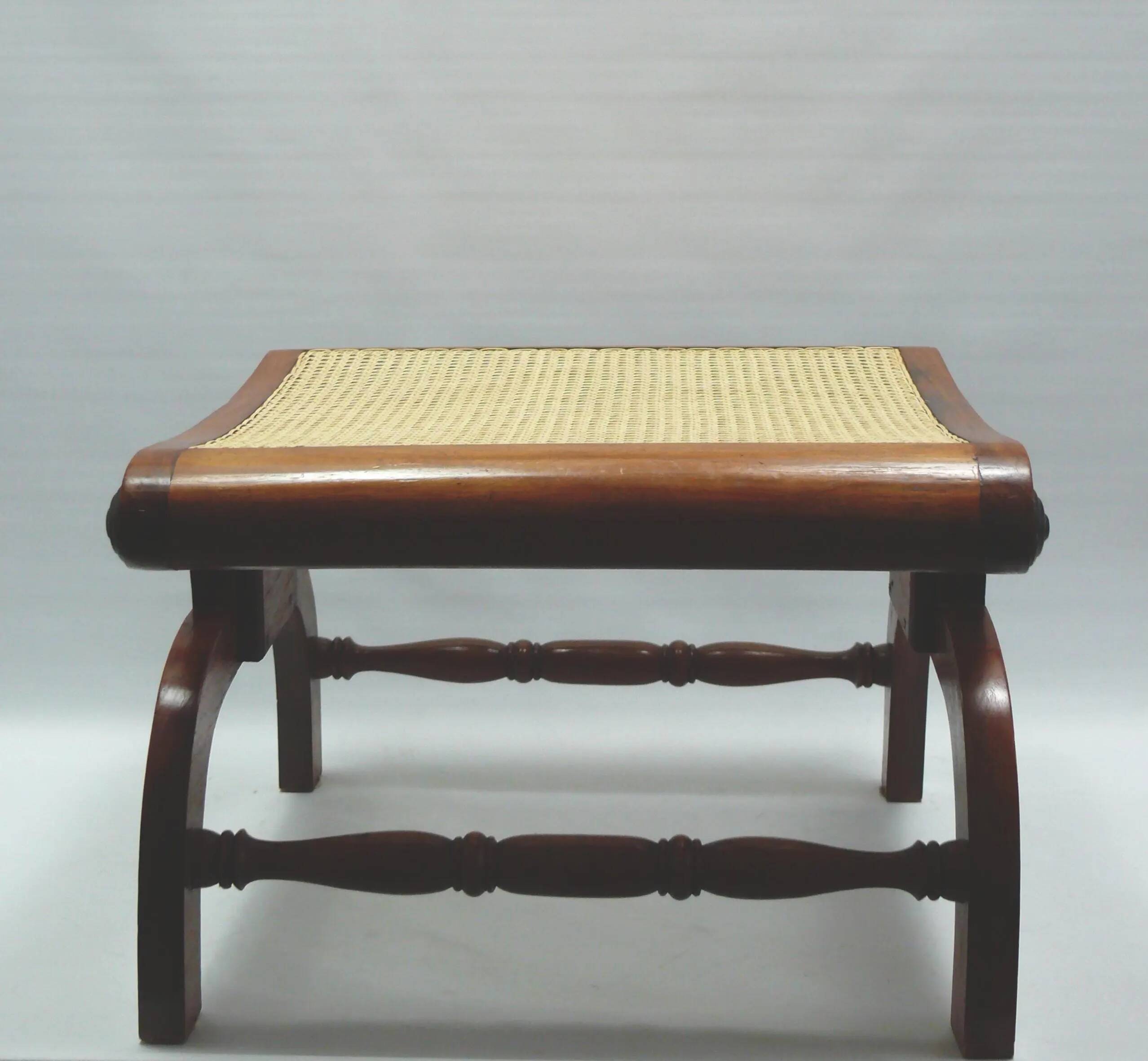 English colonial style ottoman, solid teak, with Viennese cane seat, mid-20th century.
