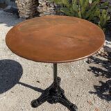 Bistro table in wrought iron and cast iron