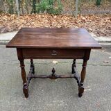 Louis XIV style writing desk in dark solid wood from the 19th century