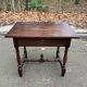 Louis XIV style writing desk in dark solid wood from the 19th century
