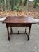 Louis XIV style writing desk in dark solid wood from the 19th century