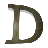 Old letter in metal (sheet metal) "D"