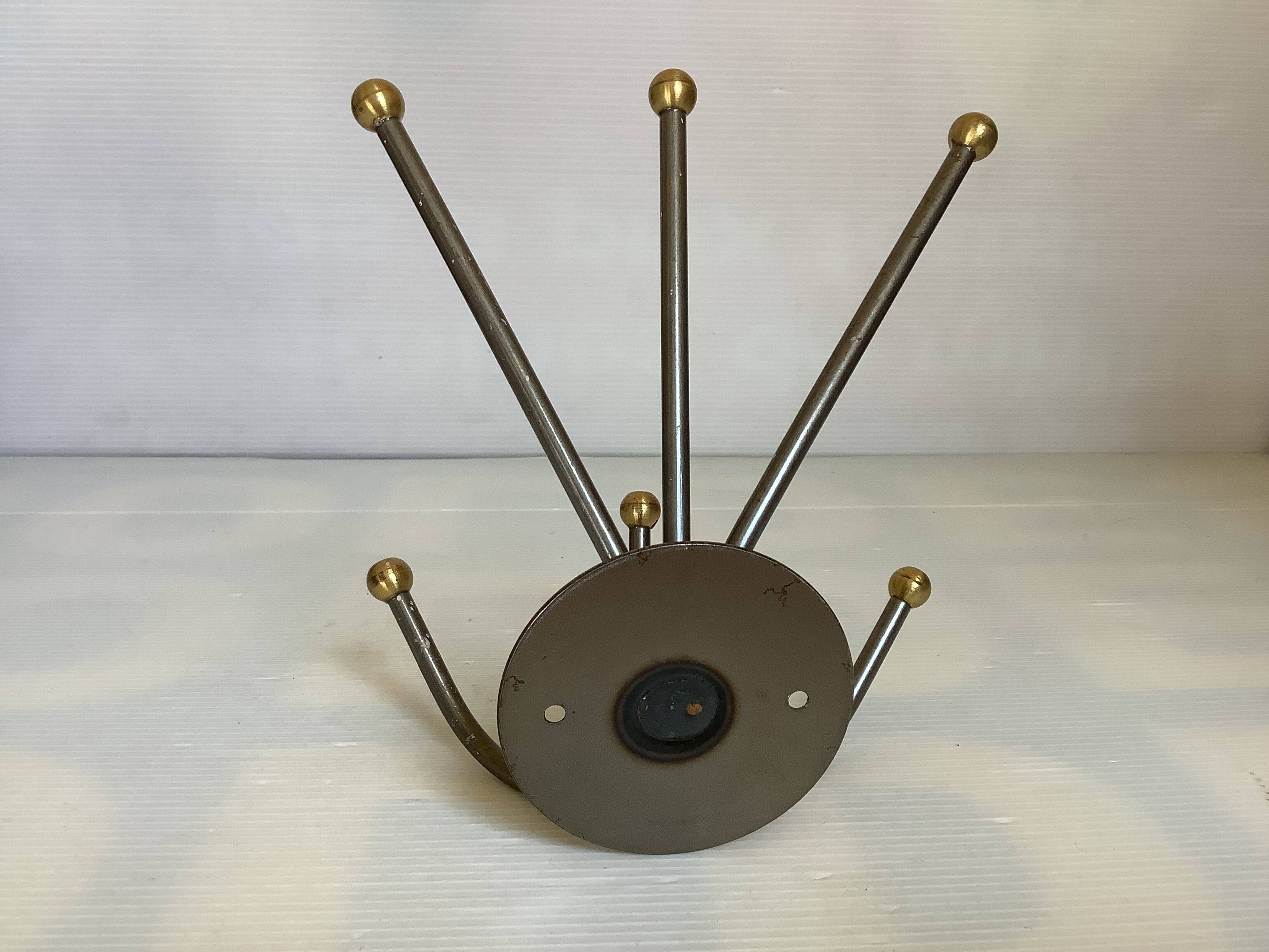 Small metal coat rack with six hooks