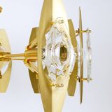 Oscar Torlasco brass chandelier of 25 inches with optical prism lenses, Italy, 1970s.