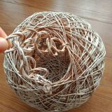 Globe suspension made of twine and wicker