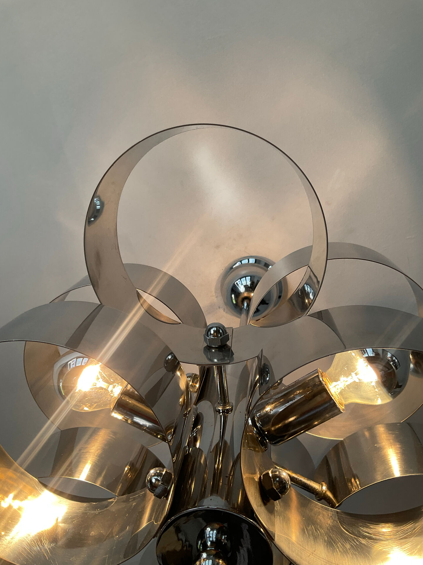 Chrome metal Space Age Sciolari chandelier from the 1970s.