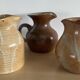Trio of vintage stoneware jug vases