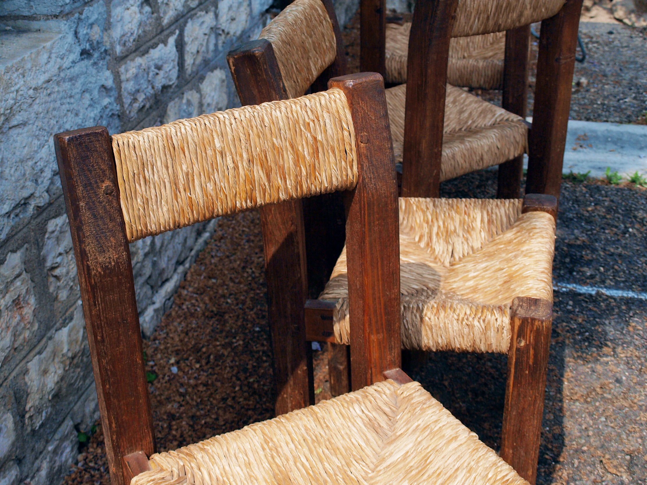 Brutalist chairs in pine and straw, France, 1950s, set of 4