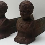 Pair of cast iron fireplace chenets "children"
