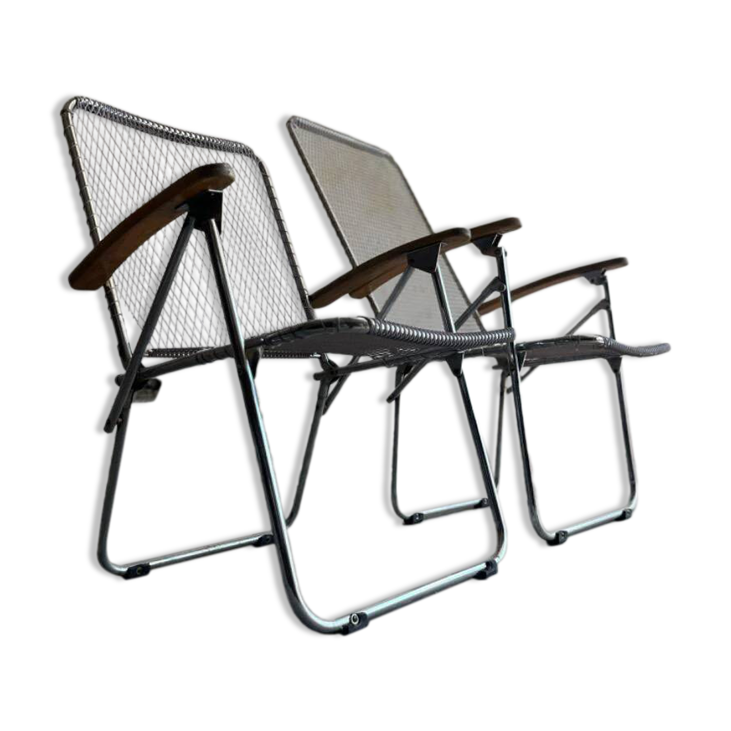 Pair of vintage silver aluminum wire folding chairs with wooden armrests — industrial minimalist