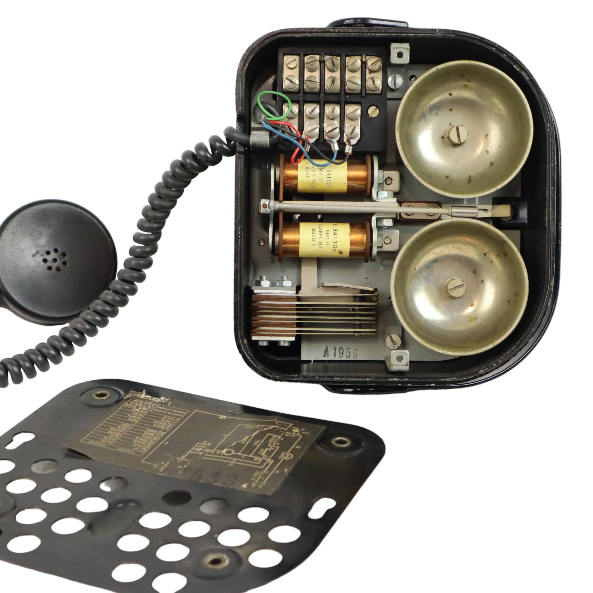 Old black telephone with rotary dial metal Bakelite RTT 56B