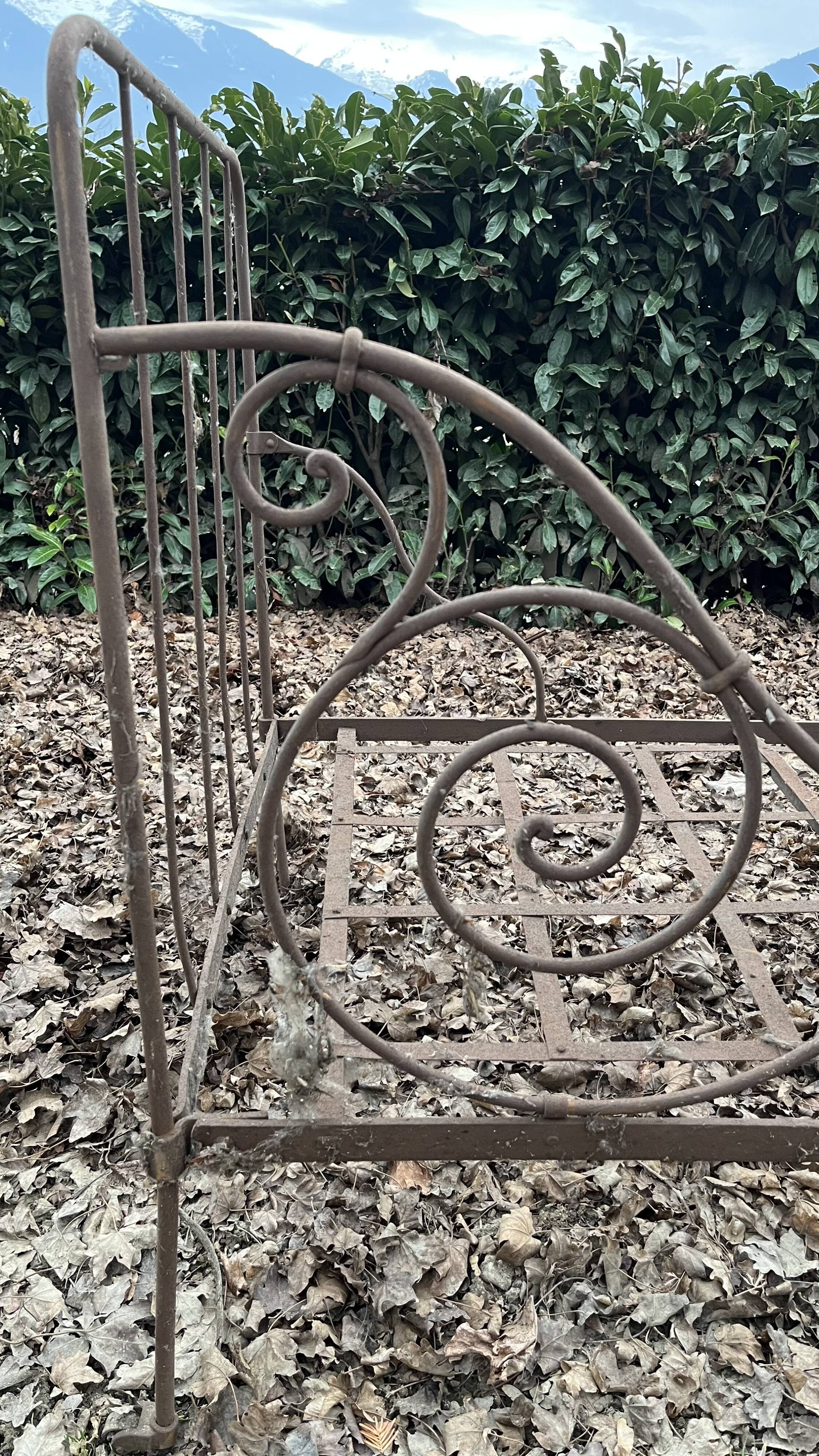 Folding wrought iron bed 1900
