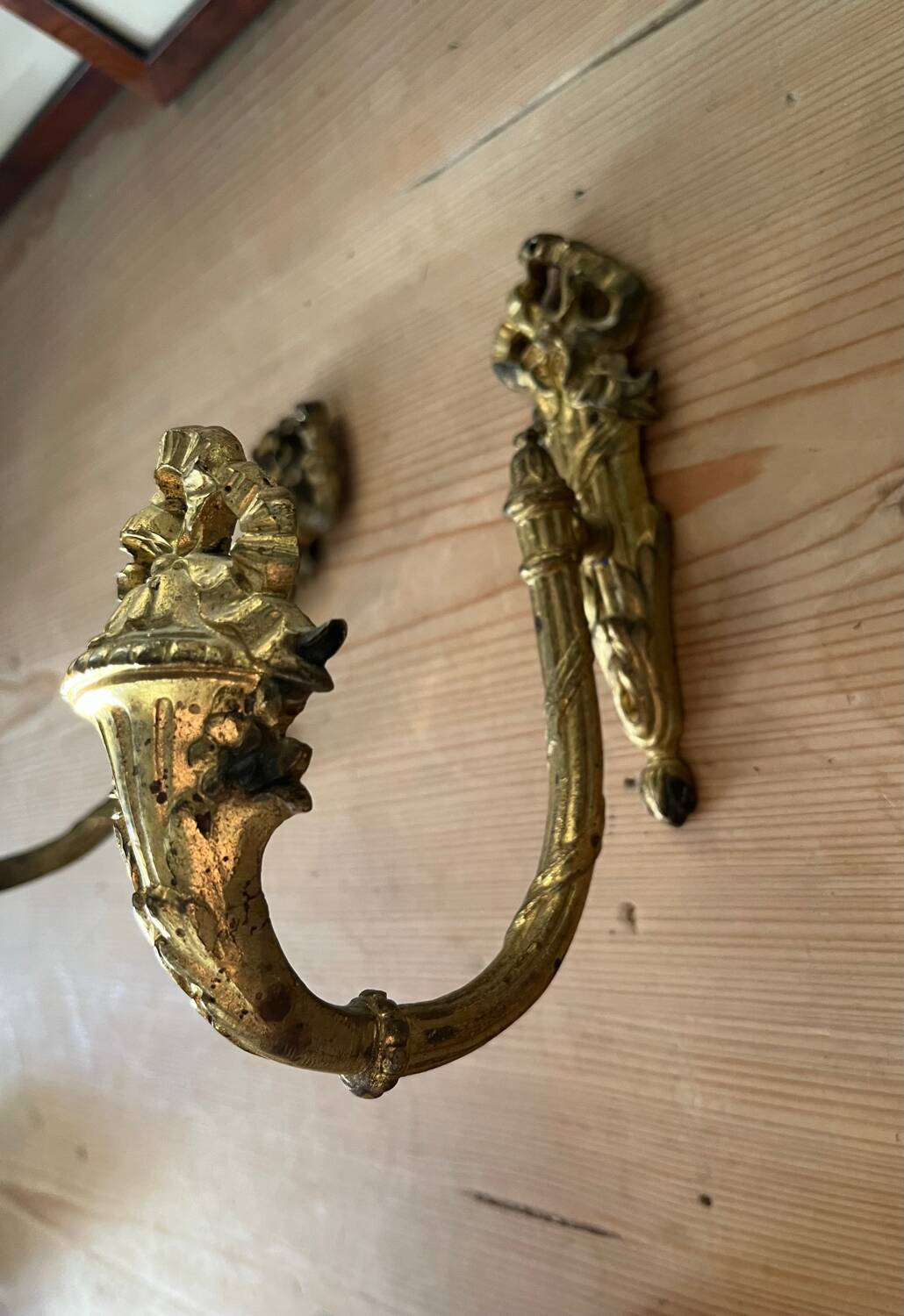 Pair of bronze curtain tiebacks