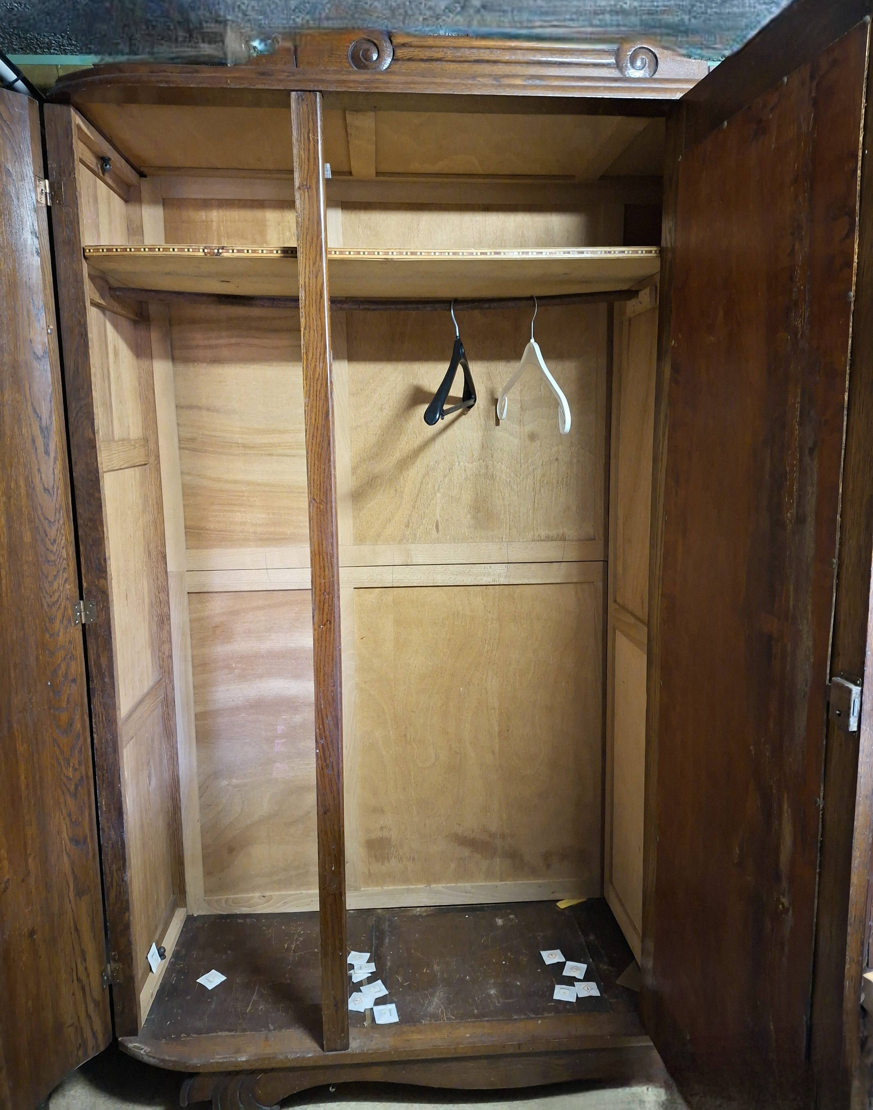 wardrobe with a mirror in the centre