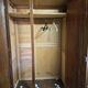 wardrobe with a mirror in the centre