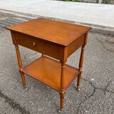 High bedside table in solid wood with drawers on casters
