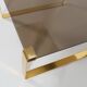 Mid-century coffee table with gold plated base and glass top, 1970s