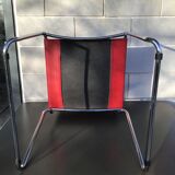 Chrome sled chair and red leather