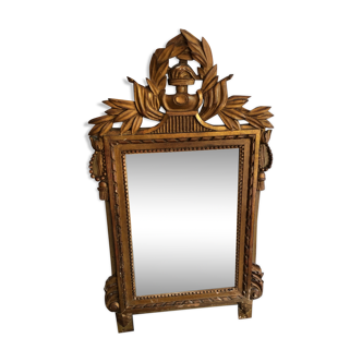 Gilded wooden pediment mirror
