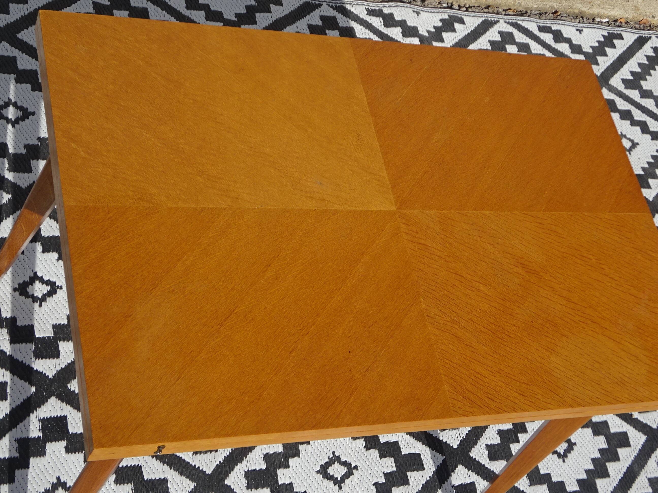 Scandinavian portfolio table model "half-century" by SAM