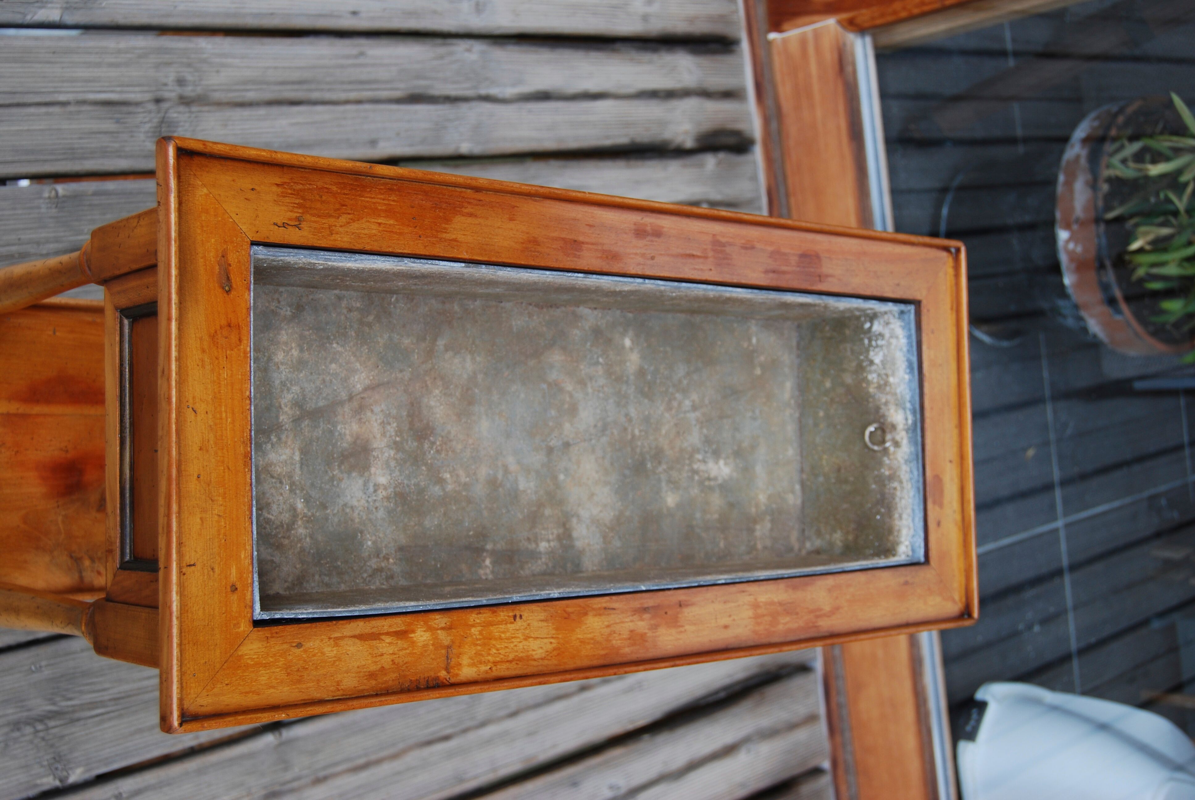 Executive-style indoor planter on feet