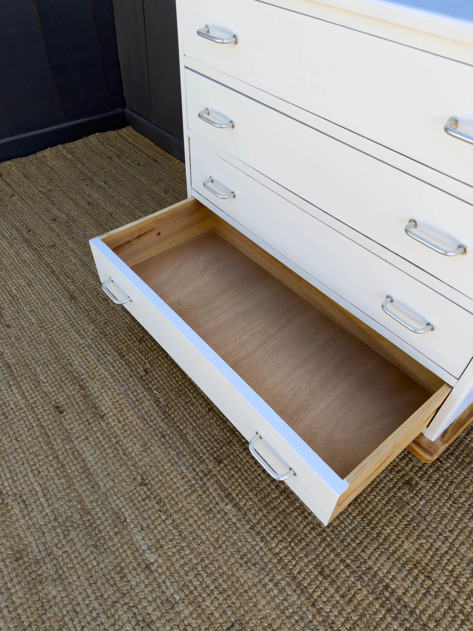 Compass leg chest of drawers