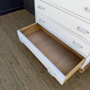 Compass leg chest of drawers