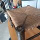 Small rustic vintage stool in wood and straw.