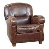 Sheep leather armchair with round shapes