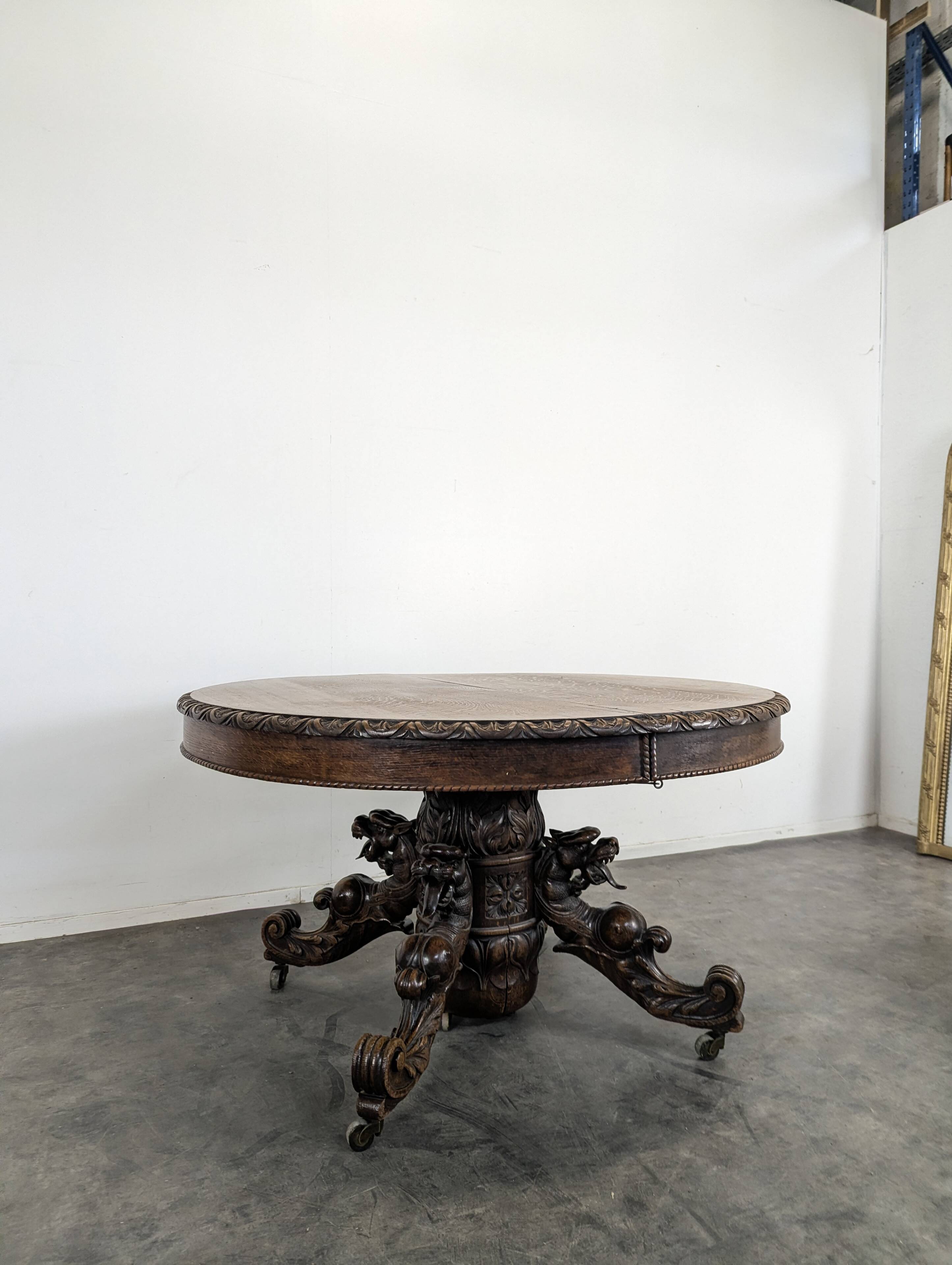 Renaissance-style gueridon with dragon heads in oak