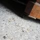 Old wooden chest of drawers with 4 drawers on wheels