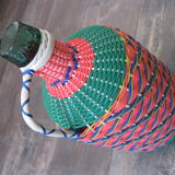 Vintage and multi-coloured demijohn