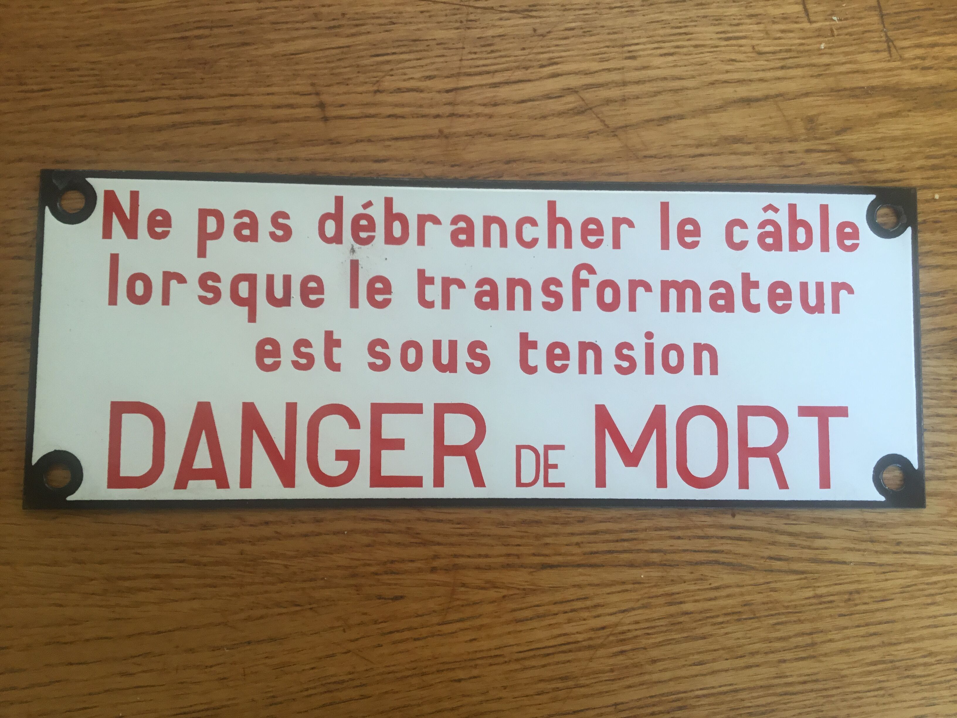 Enamelled security plate