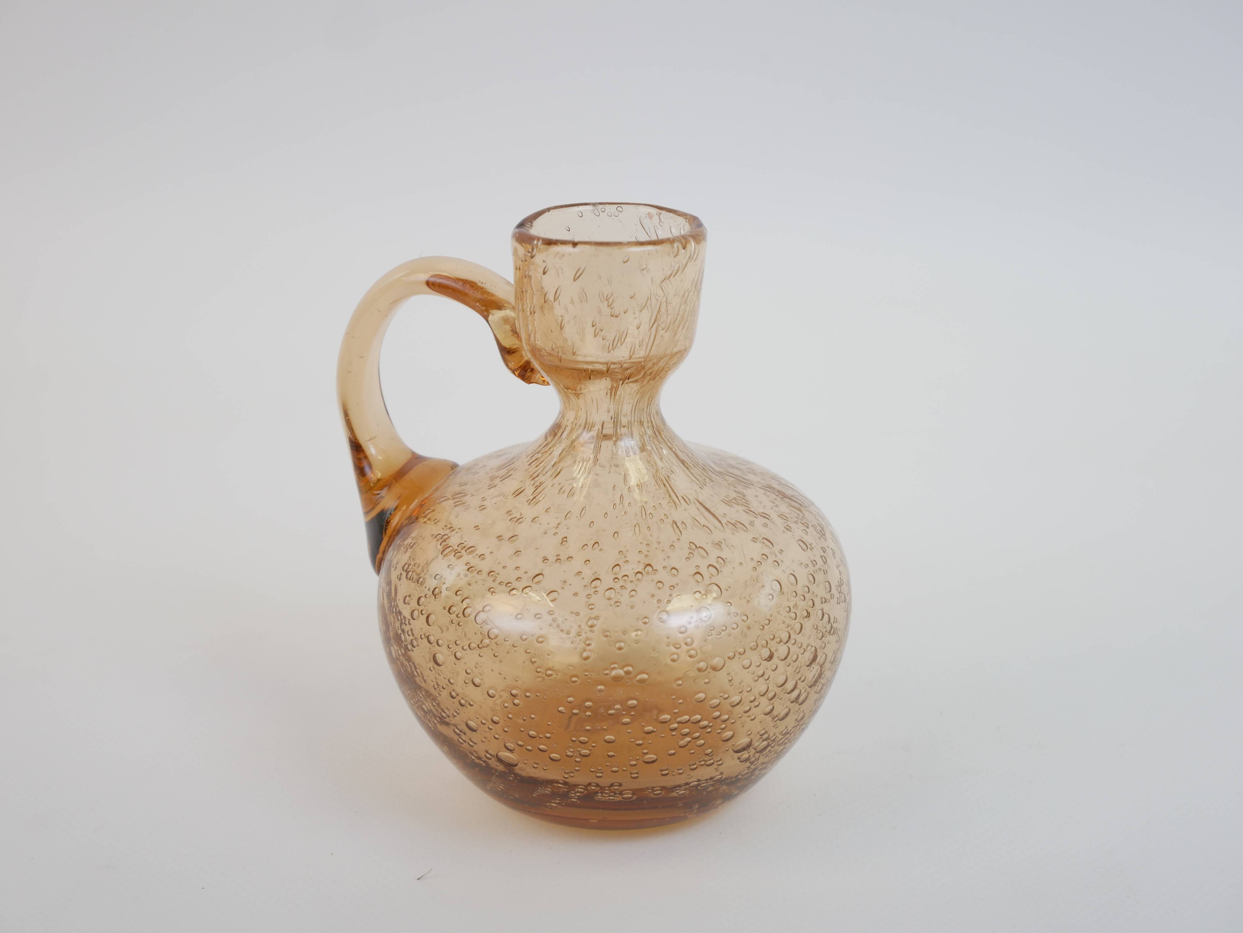 Petit porte bougie en verre bullé rose de Biot